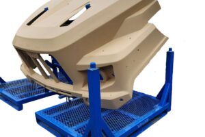 Fiberglass hood with CARC paint for defense industry.